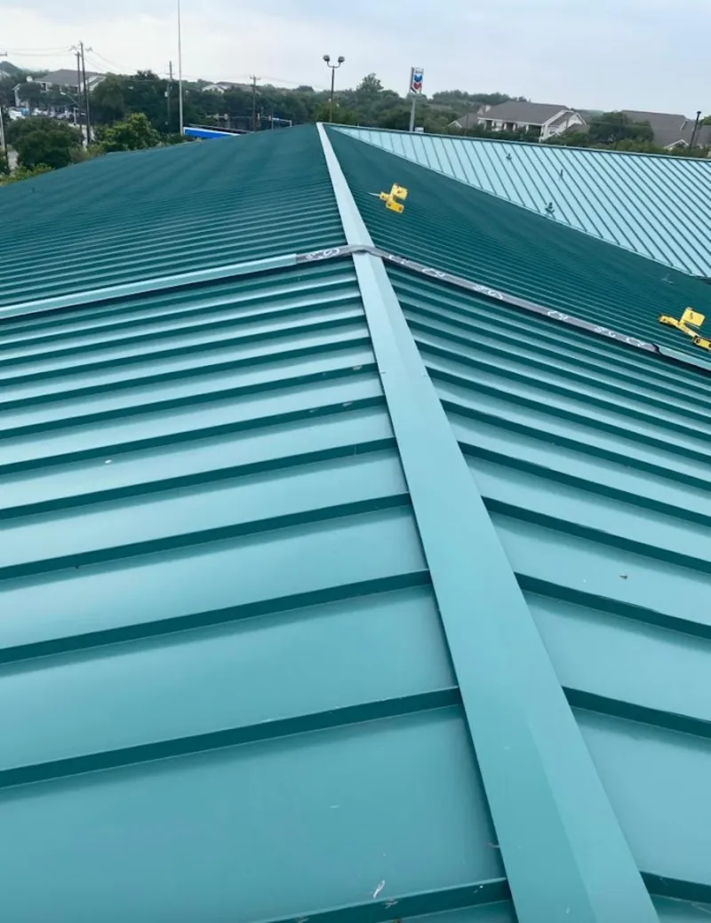 Green commercial metal roof ridge and valley for Metal Roof Repair in Grass Valley